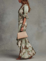 Anna - Asymmetrical long dress in green satin with V-neck, flared puff sleeves, and floral pattern