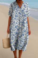Magnolia - Ivory Dress Adorned with Porcelain Blue Floral Accents